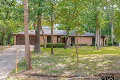 Welcome to this Traditional 3-bedroom, 2-bathroom home nestled on Hide-A-Way Lake Golf Course in Texas - for sale on GolfHomes.com, golf home, golf lot