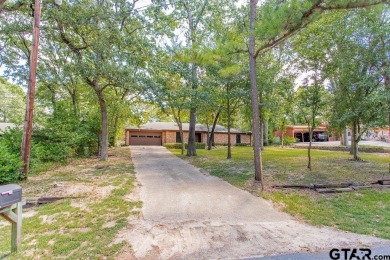 Welcome to this Traditional 3-bedroom, 2-bathroom home nestled on Hide-A-Way Lake Golf Course in Texas - for sale on GolfHomes.com, golf home, golf lot