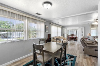 Welcome to this beautifully maintained 2-bedroom, 2-bathroom on Zellwood Station Country Club in Florida - for sale on GolfHomes.com, golf home, golf lot