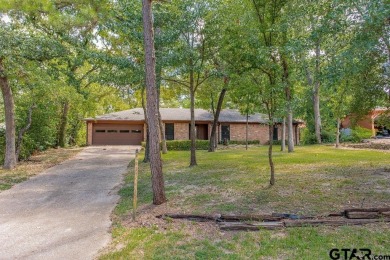 Welcome to this Traditional 3-bedroom, 2-bathroom home nestled on Hide-A-Way Lake Golf Course in Texas - for sale on GolfHomes.com, golf home, golf lot