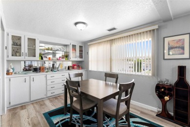 Welcome to this beautifully maintained 2-bedroom, 2-bathroom on Zellwood Station Country Club in Florida - for sale on GolfHomes.com, golf home, golf lot