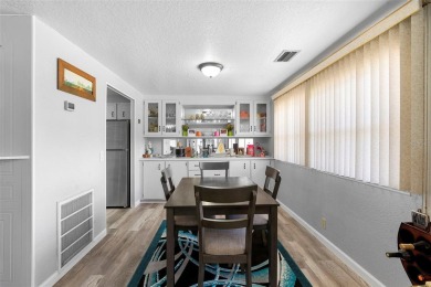 Welcome to this beautifully maintained 2-bedroom, 2-bathroom on Zellwood Station Country Club in Florida - for sale on GolfHomes.com, golf home, golf lot