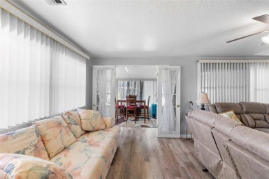 Welcome to this beautifully maintained 2-bedroom, 2-bathroom on Zellwood Station Country Club in Florida - for sale on GolfHomes.com, golf home, golf lot