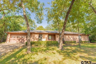 Welcome to this Traditional 3-bedroom, 2-bathroom home nestled on Hide-A-Way Lake Golf Course in Texas - for sale on GolfHomes.com, golf home, golf lot