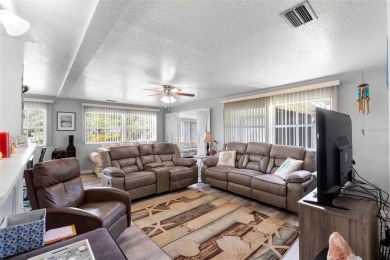 Welcome to this beautifully maintained 2-bedroom, 2-bathroom on Zellwood Station Country Club in Florida - for sale on GolfHomes.com, golf home, golf lot