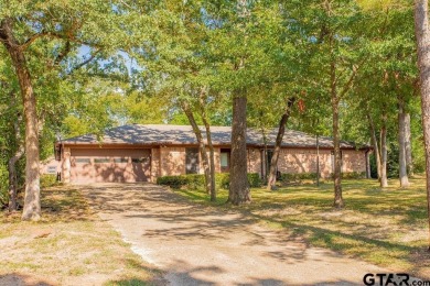 Welcome to this Traditional 3-bedroom, 2-bathroom home nestled on Hide-A-Way Lake Golf Course in Texas - for sale on GolfHomes.com, golf home, golf lot