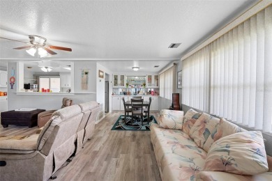 Welcome to this beautifully maintained 2-bedroom, 2-bathroom on Zellwood Station Country Club in Florida - for sale on GolfHomes.com, golf home, golf lot