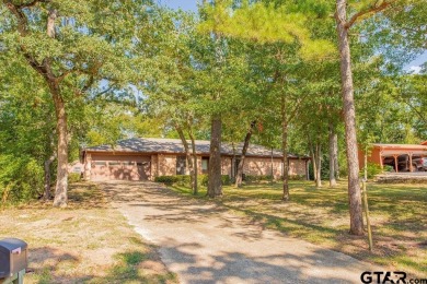 Welcome to this Traditional 3-bedroom, 2-bathroom home nestled on Hide-A-Way Lake Golf Course in Texas - for sale on GolfHomes.com, golf home, golf lot