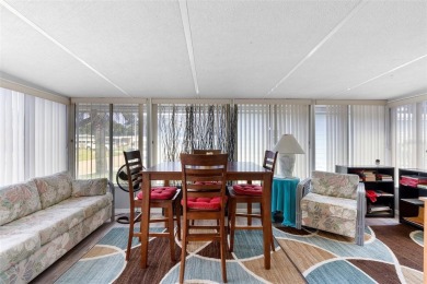 Welcome to this beautifully maintained 2-bedroom, 2-bathroom on Zellwood Station Country Club in Florida - for sale on GolfHomes.com, golf home, golf lot