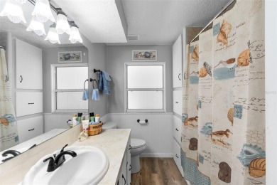 Welcome to this beautifully maintained 2-bedroom, 2-bathroom on Zellwood Station Country Club in Florida - for sale on GolfHomes.com, golf home, golf lot