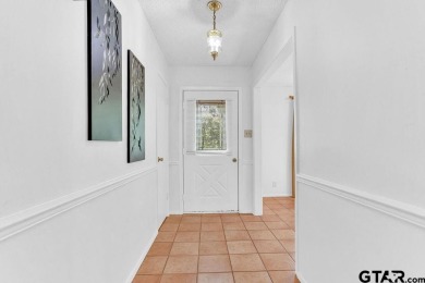 Welcome to this Traditional 3-bedroom, 2-bathroom home nestled on Hide-A-Way Lake Golf Course in Texas - for sale on GolfHomes.com, golf home, golf lot