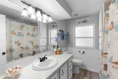 Welcome to this beautifully maintained 2-bedroom, 2-bathroom on Zellwood Station Country Club in Florida - for sale on GolfHomes.com, golf home, golf lot