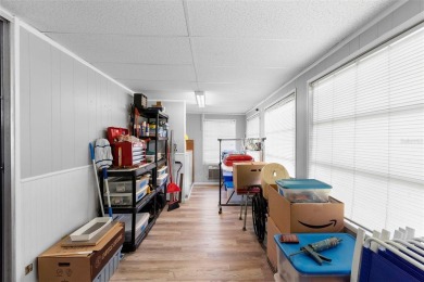 Welcome to this beautifully maintained 2-bedroom, 2-bathroom on Zellwood Station Country Club in Florida - for sale on GolfHomes.com, golf home, golf lot