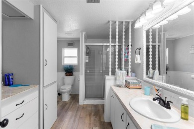 Welcome to this beautifully maintained 2-bedroom, 2-bathroom on Zellwood Station Country Club in Florida - for sale on GolfHomes.com, golf home, golf lot
