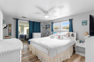 Welcome to this beautifully maintained 2-bedroom, 2-bathroom on Zellwood Station Country Club in Florida - for sale on GolfHomes.com, golf home, golf lot