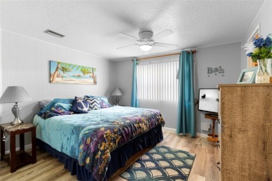 Welcome to this beautifully maintained 2-bedroom, 2-bathroom on Zellwood Station Country Club in Florida - for sale on GolfHomes.com, golf home, golf lot