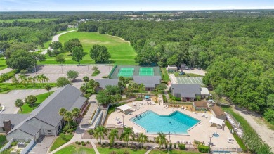 Welcome to this beautifully maintained 2-bedroom, 2-bathroom on Zellwood Station Country Club in Florida - for sale on GolfHomes.com, golf home, golf lot