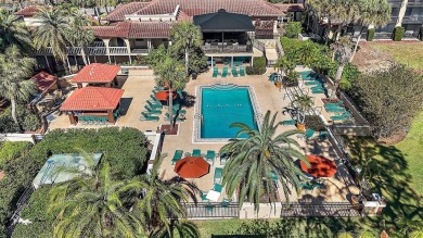 This Mediterranean-style condo includes a private elevator and on Mission Inn Resort and Club in Florida - for sale on GolfHomes.com, golf home, golf lot