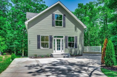 Welcome to 1673 Carriage Ln in Little River, SC -- a modern on Glen Dornoch Waterway Golf Links in South Carolina - for sale on GolfHomes.com, golf home, golf lot