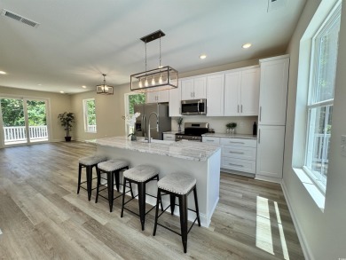 Welcome to 1673 Carriage Ln in Little River, SC -- a modern on Glen Dornoch Waterway Golf Links in South Carolina - for sale on GolfHomes.com, golf home, golf lot