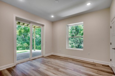 Welcome to 1673 Carriage Ln in Little River, SC -- a modern on Glen Dornoch Waterway Golf Links in South Carolina - for sale on GolfHomes.com, golf home, golf lot