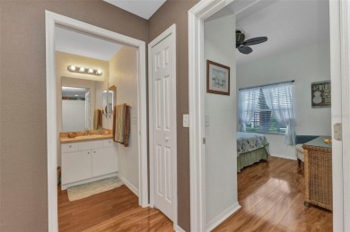 Discover this immaculate 2-bedroom, 2-bath condo with a den on Sabal Trace Golf and Country Club in Florida - for sale on GolfHomes.com, golf home, golf lot