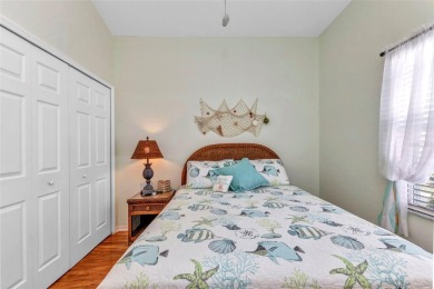 Discover this immaculate 2-bedroom, 2-bath condo with a den on Sabal Trace Golf and Country Club in Florida - for sale on GolfHomes.com, golf home, golf lot