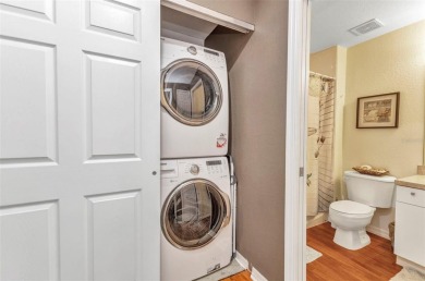 Discover this immaculate 2-bedroom, 2-bath condo with a den on Sabal Trace Golf and Country Club in Florida - for sale on GolfHomes.com, golf home, golf lot