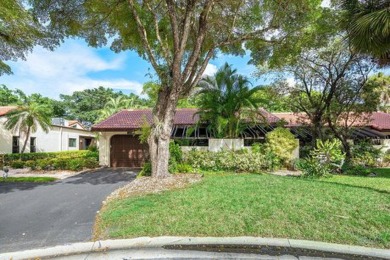 SPACIOUS WATERFRONT UNIT WITH NEW ROOF, GARAGE IN SOUGHT AFTER on Boca Lago Golf and Country Club in Florida - for sale on GolfHomes.com, golf home, golf lot