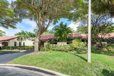 SPACIOUS WATERFRONT UNIT WITH NEW ROOF, GARAGE IN SOUGHT AFTER on Boca Lago Golf and Country Club in Florida - for sale on GolfHomes.com, golf home, golf lot