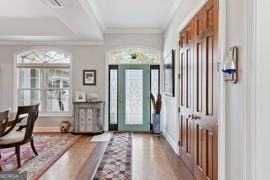 Beautiful custom-designed coastal retreat located in the highly on The Golf Club At Sanctuary Cove in Georgia - for sale on GolfHomes.com, golf home, golf lot