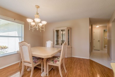 Welcome to this beautifully maintained 3-bedroom, 2-bath on Highland Lakes Executive Golf Course in Florida - for sale on GolfHomes.com, golf home, golf lot