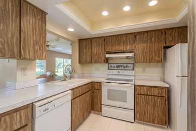 Welcome to this beautifully maintained 3-bedroom, 2-bath on Highland Lakes Executive Golf Course in Florida - for sale on GolfHomes.com, golf home, golf lot