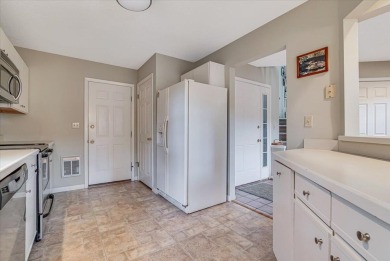 Enjoy resort-style living in this bright and cozy townhouse on Buck Hill Golf Club  in Pennsylvania - for sale on GolfHomes.com, golf home, golf lot