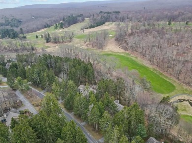 Enjoy resort-style living in this bright and cozy townhouse on Buck Hill Golf Club  in Pennsylvania - for sale on GolfHomes.com, golf home, golf lot