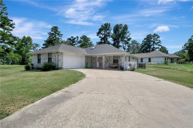 Discover this gorgeous 3-bedroom, 2-bathroom home in the coveted on Whispering Pines Golf Club in Texas - for sale on GolfHomes.com, golf home, golf lot