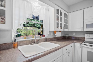 This 4-bed 3 bathroom home in Longwood offers multi-generational on Rolling Hills Golf Club in Florida - for sale on GolfHomes.com, golf home, golf lot