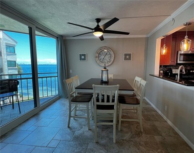 Welcome to La Puerta Del Sol, a serene waterfront retreat on Isla Del Sol Yacht and Country Club in Florida - for sale on GolfHomes.com, golf home, golf lot