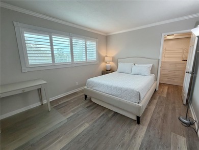 Welcome to La Puerta Del Sol, a serene waterfront retreat on Isla Del Sol Yacht and Country Club in Florida - for sale on GolfHomes.com, golf home, golf lot