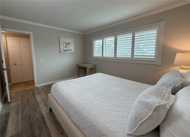 Welcome to La Puerta Del Sol, a serene waterfront retreat on Isla Del Sol Yacht and Country Club in Florida - for sale on GolfHomes.com, golf home, golf lot