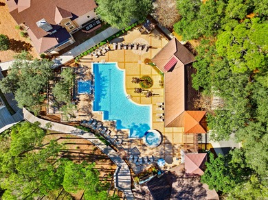 Located within the gated community of Wild Heron, this on Sharks Tooth Golf Club in Florida - for sale on GolfHomes.com, golf home, golf lot