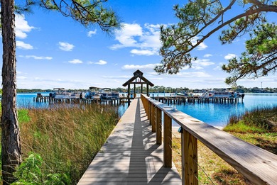 Located within the gated community of Wild Heron, this on Sharks Tooth Golf Club in Florida - for sale on GolfHomes.com, golf home, golf lot