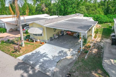 (Ver Espanol Abajo)  Lot rent $587 includes use of park on Lake Henry Golf Club in Florida - for sale on GolfHomes.com, golf home, golf lot