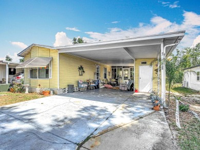 (Ver Espanol Abajo)  Lot rent $587 includes use of park on Lake Henry Golf Club in Florida - for sale on GolfHomes.com, golf home, golf lot
