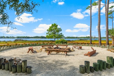 Located within the gated community of Wild Heron, this on Sharks Tooth Golf Club in Florida - for sale on GolfHomes.com, golf home, golf lot