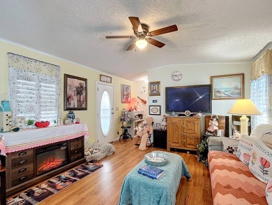 (Ver Espanol Abajo)  Lot rent $587 includes use of park on Lake Henry Golf Club in Florida - for sale on GolfHomes.com, golf home, golf lot