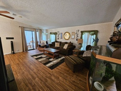 Please note; buyers do not own the land. This 2-bedroom, 2 bath on Big Cypress Golf and Country Club in Florida - for sale on GolfHomes.com, golf home, golf lot