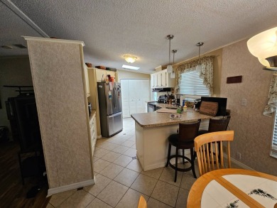 Please note; buyers do not own the land. This 2-bedroom, 2 bath on Big Cypress Golf and Country Club in Florida - for sale on GolfHomes.com, golf home, golf lot