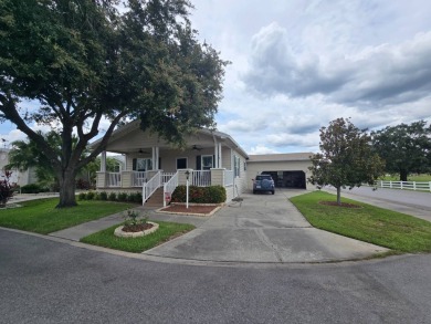 Leisure and Lifestyle await your arrival in beautiful Odessa on Silver Dollar Golf and Trap Club in Florida - for sale on GolfHomes.com, golf home, golf lot