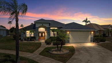 Welcome to your dream home in the heart of a serene golf course on Viera East Golf Club in Florida - for sale on GolfHomes.com, golf home, golf lot